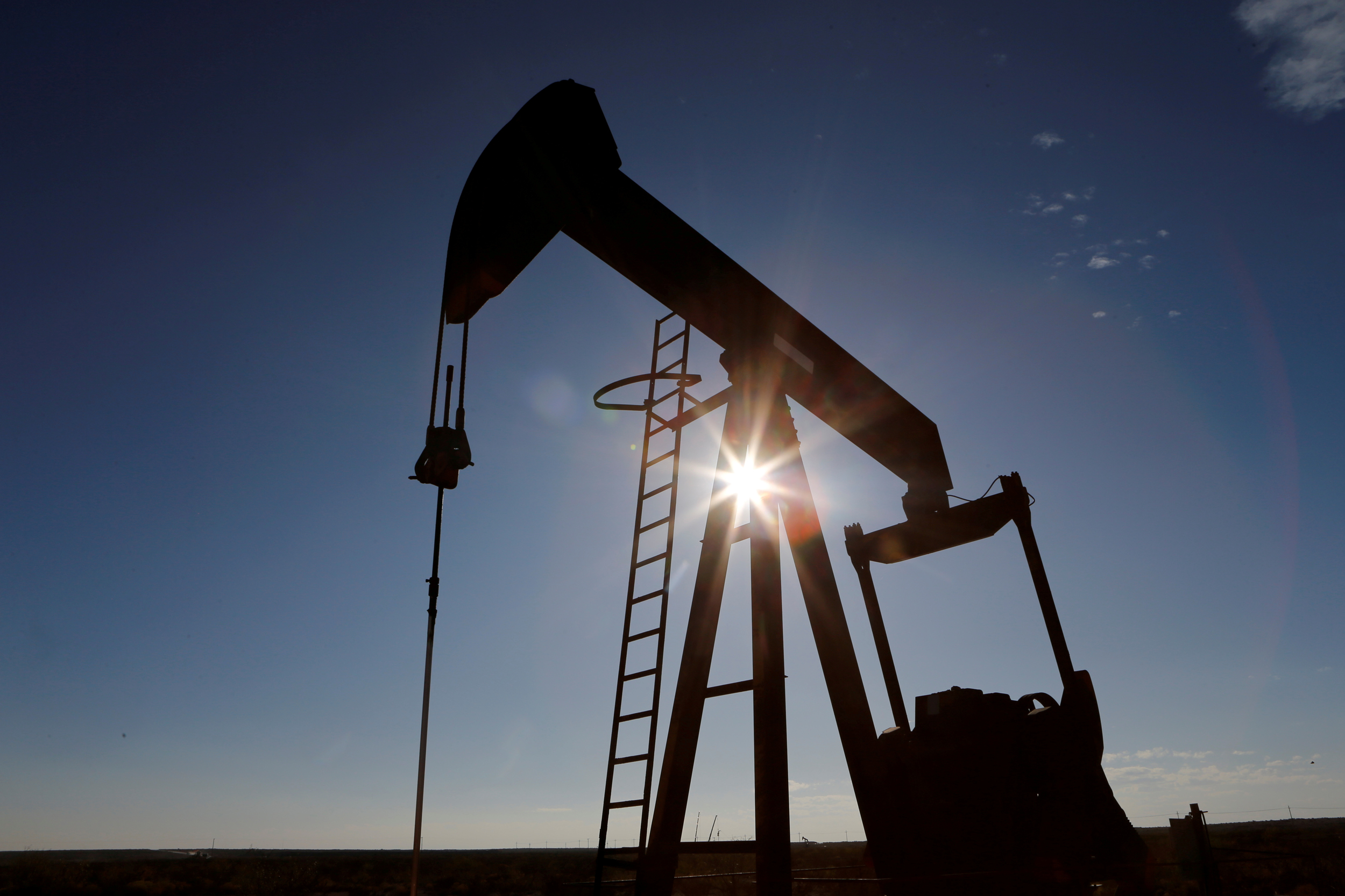 Oil Drops Below  on Macroeconomic Gloom